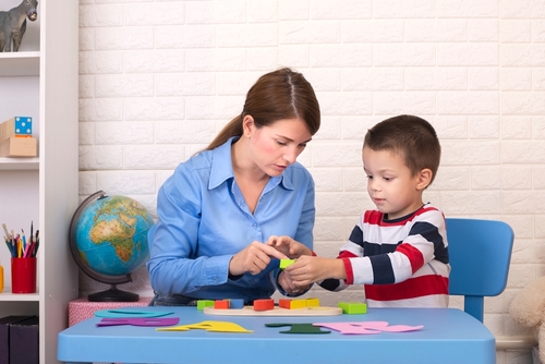 Toddler,Boy,In,Child,Occupational,Therapy,Session,Doing,Sensory,Playful